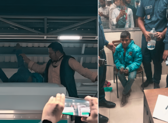 মেট্রোরেলের ছাদে দুই ব্যক্তি,সাময়িক বন্ধ ট্রেন চলাচল।